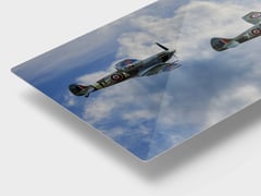 Angled close-up of V for Victory! presented on HD metal. (thumbnail 9)
