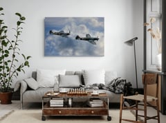 V for Victory! above a grey sofa in a bright Scandinavian living room. (thumbnail 6)