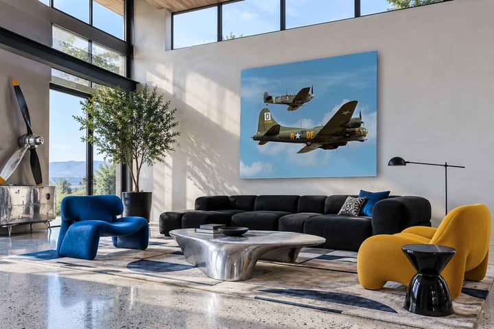 Large aviation photograph of a B-17 and a Spitfire in flight on the wall of a sunlit living room with tall windows