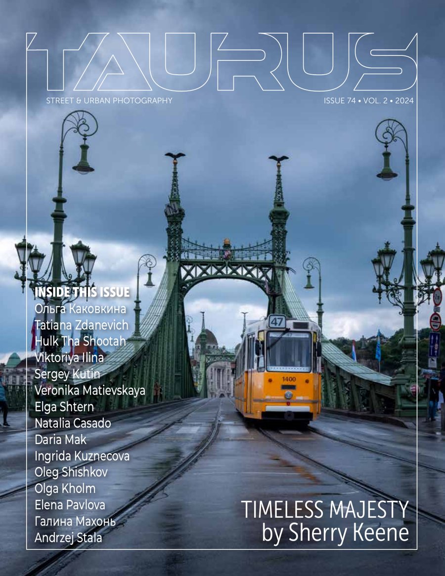Taurus Street and Urban Photography Issue 74 front cover, Timeless Majesty by Sherry Keene, a yellow tram on Liberty Bridge in Budapest