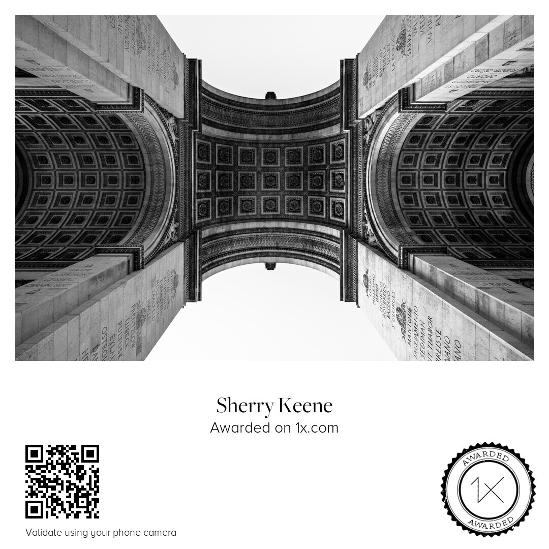 1x.com award certificate for Sherry Keene: Arc de Triomphe ceiling in black and white, with QR validation code and Awarded seal