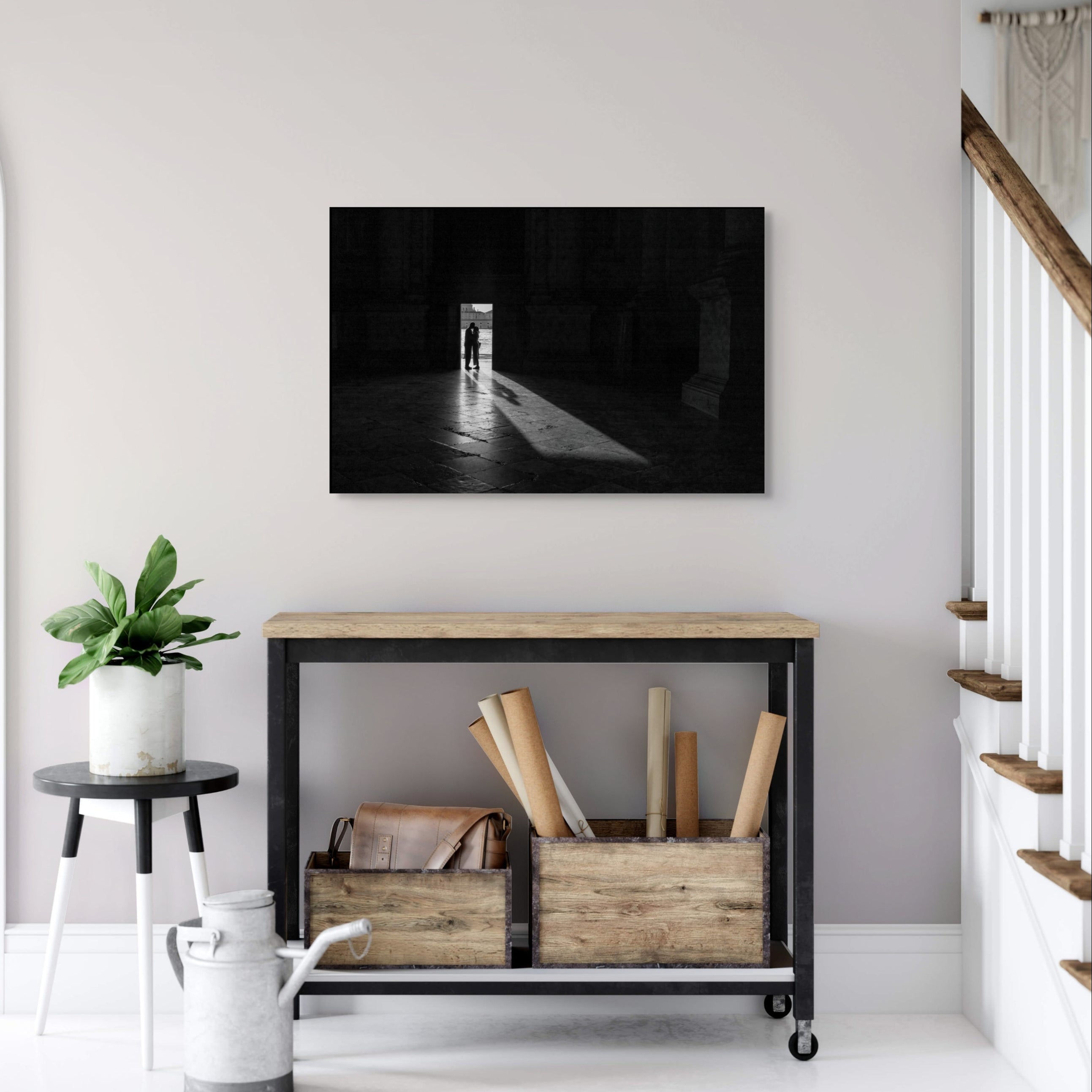 Framed 24x36 black and white fine art print Two Souls in Sacred Stillness by Sherry Keene, Refocus Award Honorable Mention – evocative Venice photograph of quiet connection at San Giorgio Maggiore, styled above a console table in a modern minimalist foyer, perfect for collectors looking for moody European statement art that sparks emotion