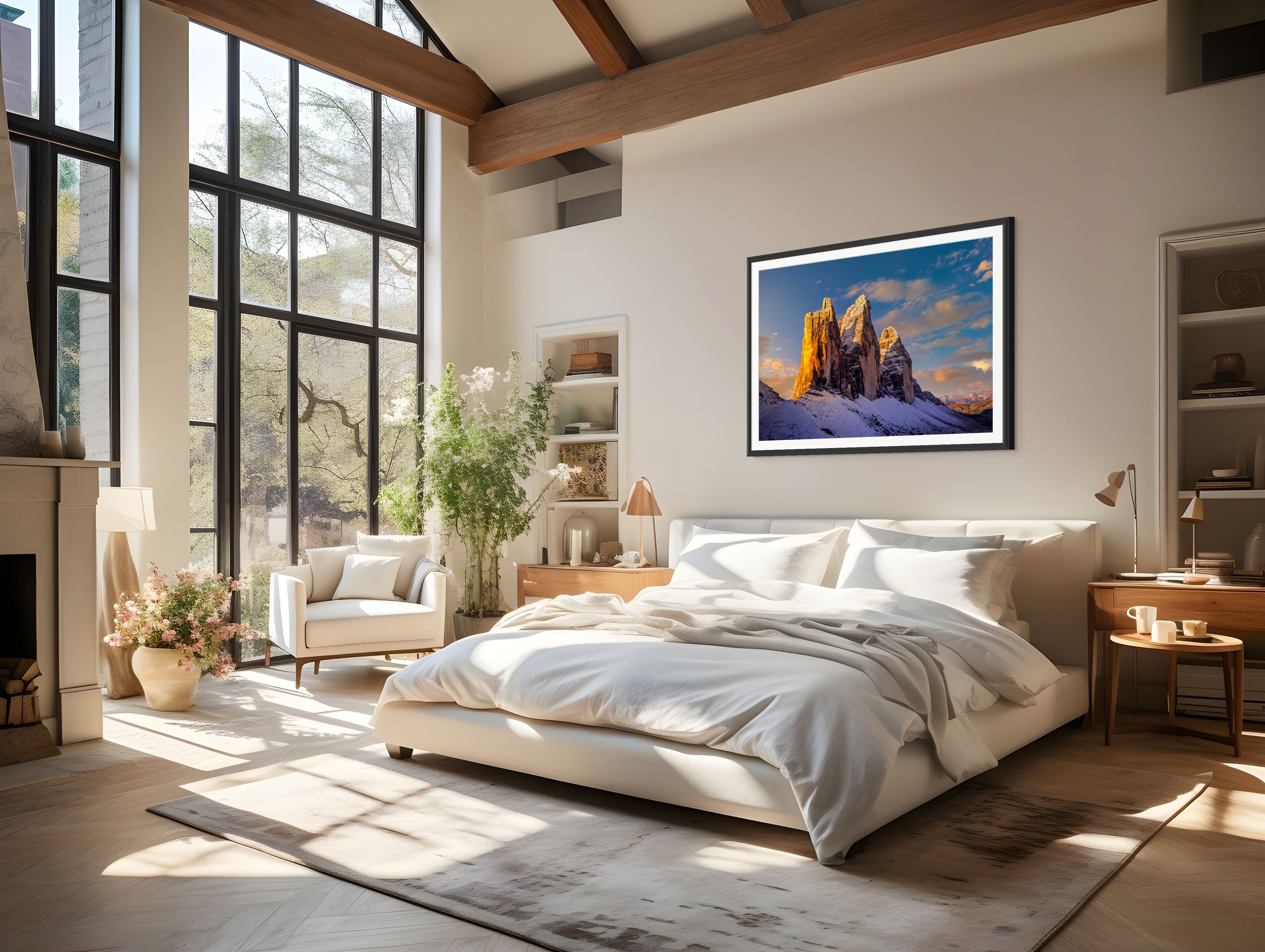 Cold Fire on Tre Cime” fine art landscape photograph by Sherry Keene displayed in a modern luxury bedroom with tall windows, warm wood tones, and soft natural light. Featuring the Tre Cime di Lavaredo (Drei Zinnen) peaks glowing in golden morning light after fresh snow. Perfect for collectors seeking large wall art, mountain photography, alpine fine art prints, or luxury bedroom wall decor. Museum-quality statement piece from KeeneFine.art.